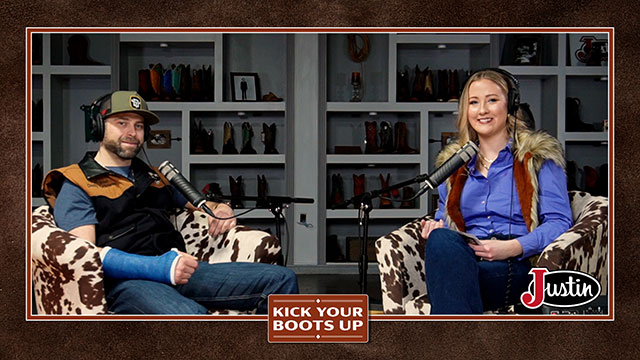 A man and a woman wearing headphones sit in a podcast studio, smiling at the camera.